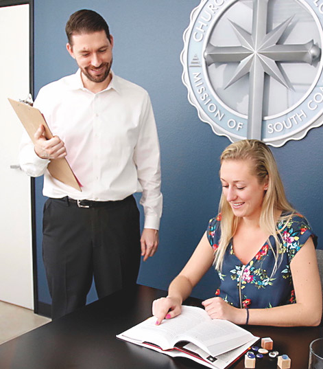 Student in the course room getting help